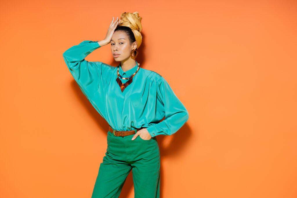 elegant-woman-posing-in-teal-top-and-headscarf-2026-03-11-07-05-19-utc