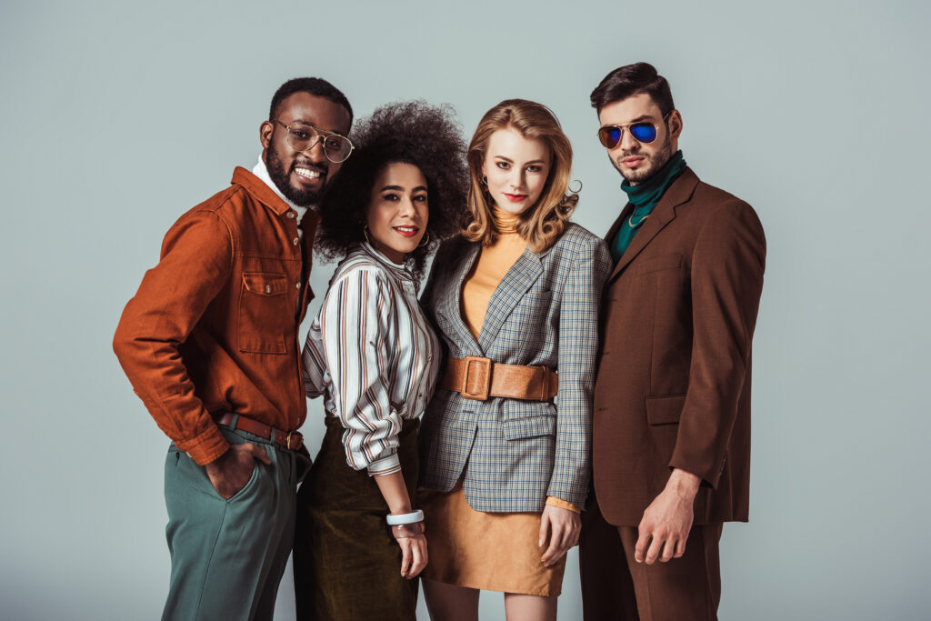 four-people-in-vintage-style-clothing-posing-2026-03-12-23-49-25-utc (1)